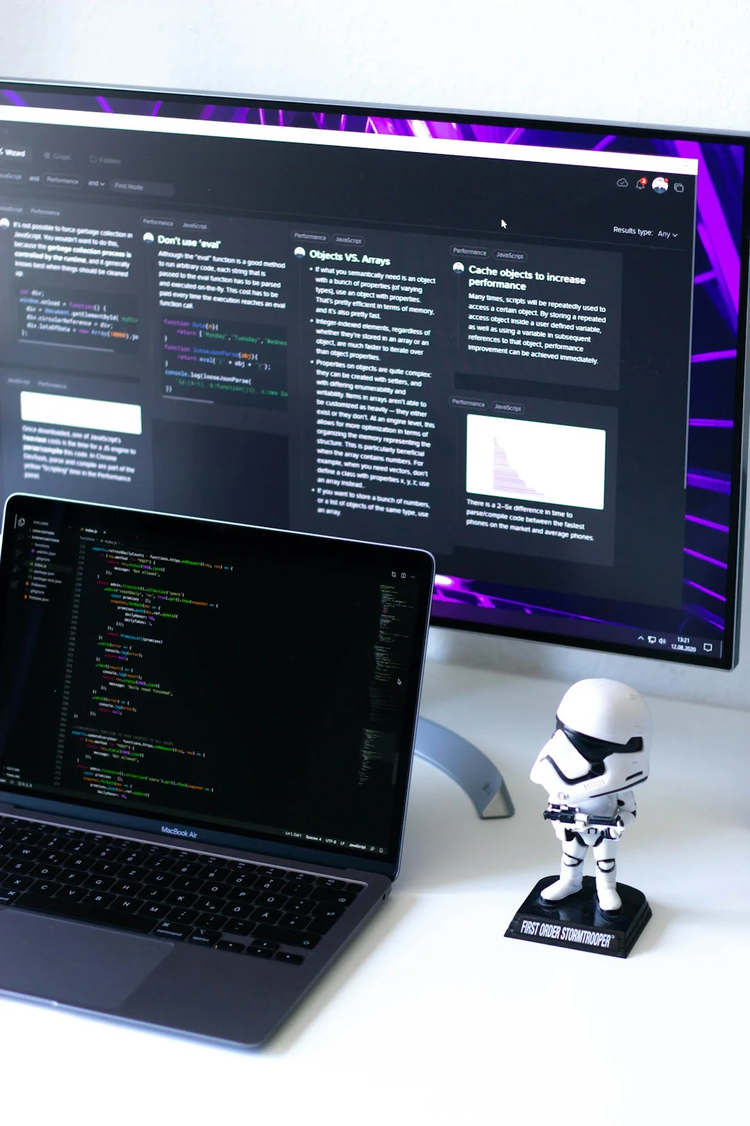 A modern computer screen displaying web design work, showcasing creative visuals in a workspace.