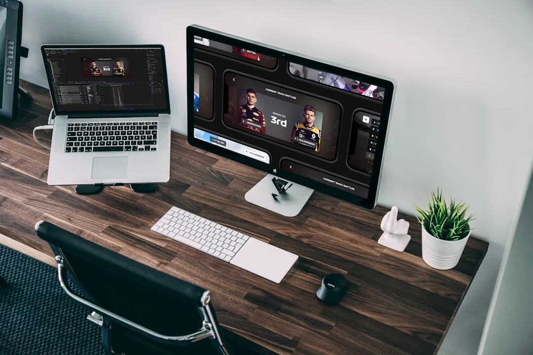 A contemporary workspace showcasing a laptop, tablet, and smartphones, ideal for tech and freelance use.